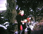 8mm_03 054 6122 driveway, snow, Alan with elf and stocking